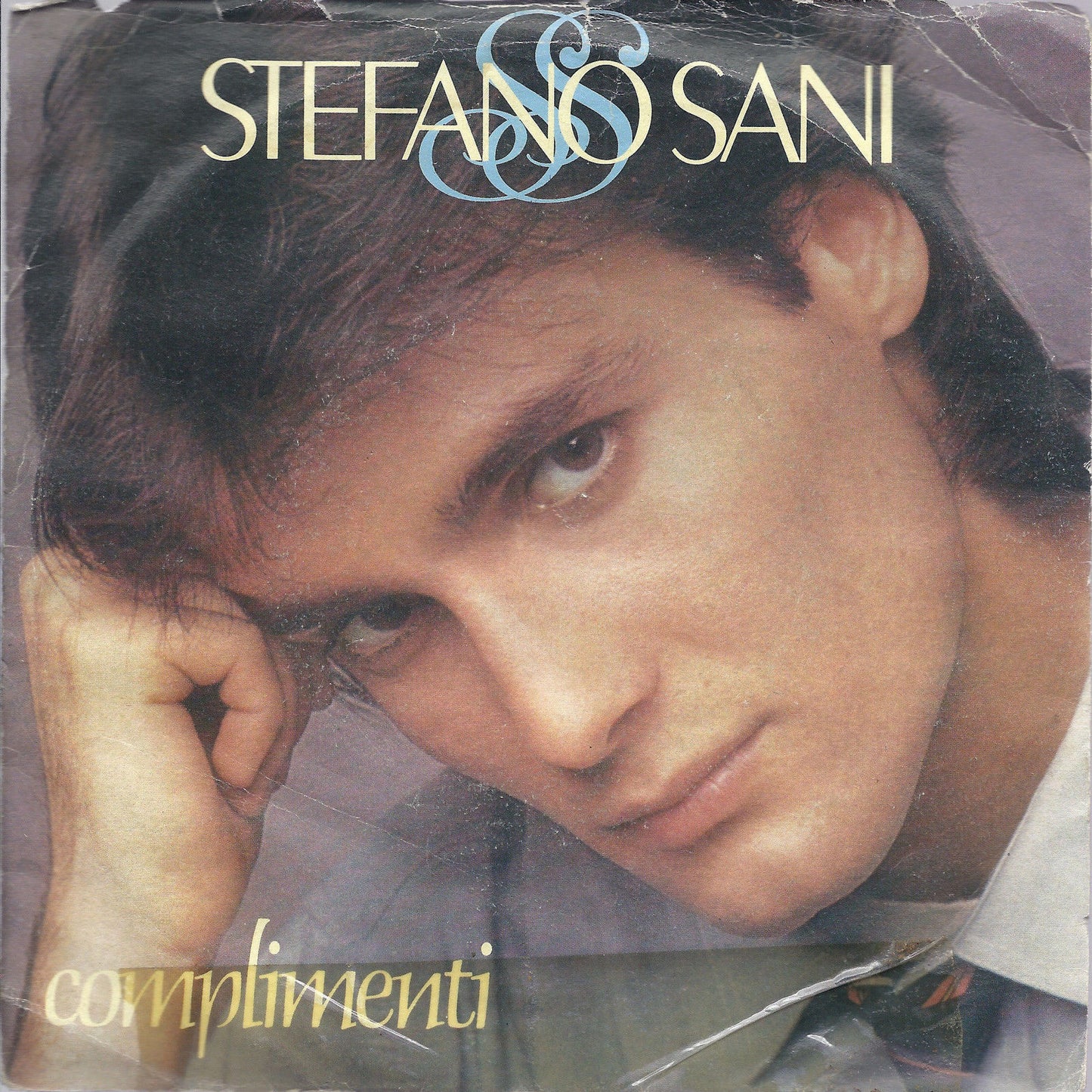 COMPLIMENTI - UNA VACANZA = STEFANO SANI