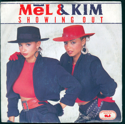 SHOWING OUT - SYSTEM # MEL & KIM