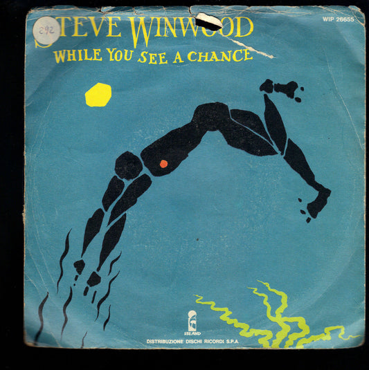 WHILE YOU SEE A CHANCE - VACANT CHAIR - STEVE WINWOOD