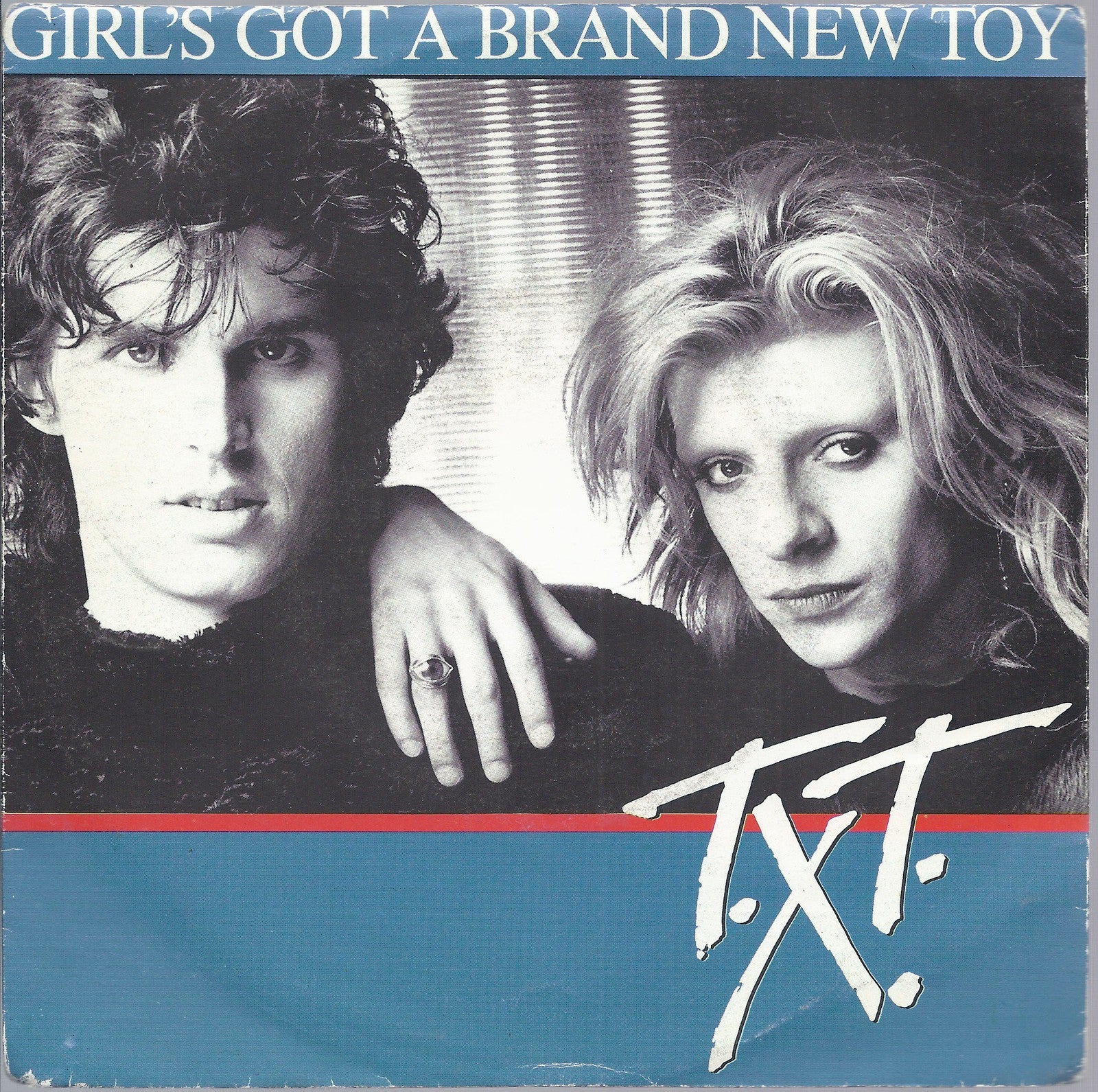 GIRL'S GOT A BRAND NEW TOY - HOT WAS THE RAINY NIGHT = T.X.T.