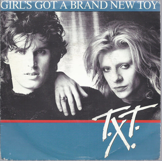GIRL'S GOT A BRAND NEW TOY - HOT WAS THE RAINY NIGHT = T.X.T.